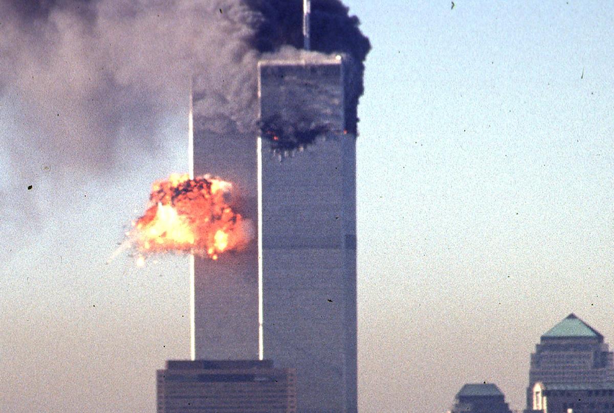 A hijacked commercial plane crashes into the World Trade Center in New York on Sept. 11, 2001. The landmark skyscrapers were destroyed in the attack. (Seth McAllister/AFP/Getty Images)
