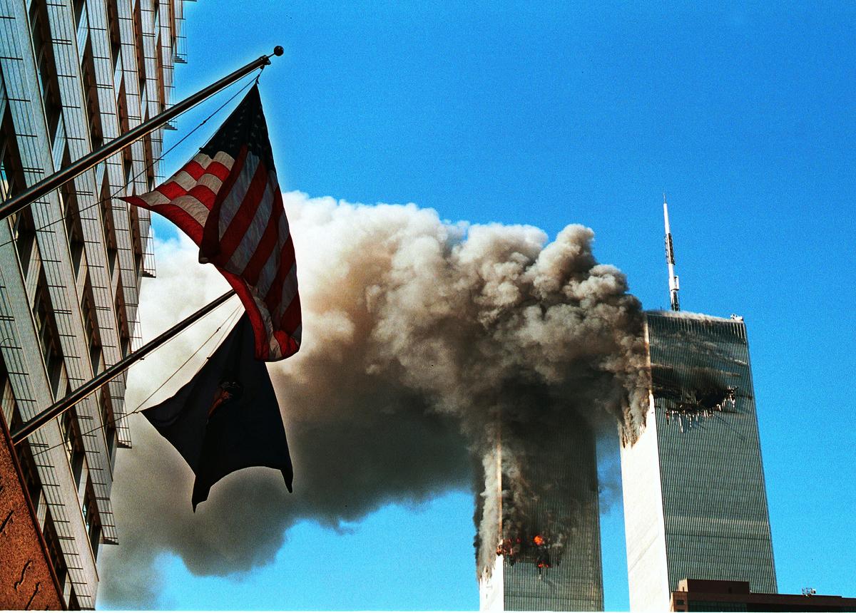 Smoke pours from the World Trade Center in New York City after being hit by two hijacked planes on Sept. 11, 2001. (Craig Allen/Getty Images)