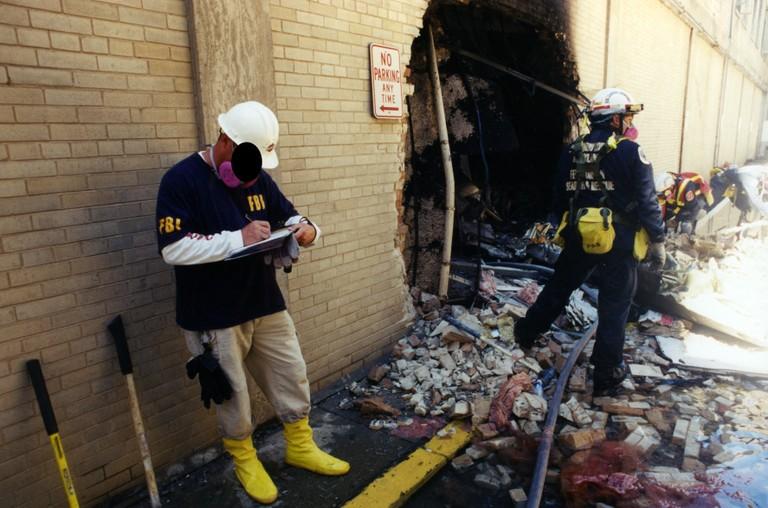 First responders on scene following an attack at the Pentagon in Arlington, Virginia, on Sept. 11, 2001, in this undated image. American Airlines Flight 77 was hijacked by al Qaeda terrorists who flew it into the building, killing 184 people. (Federal Bureau of Investigation via Getty Images)