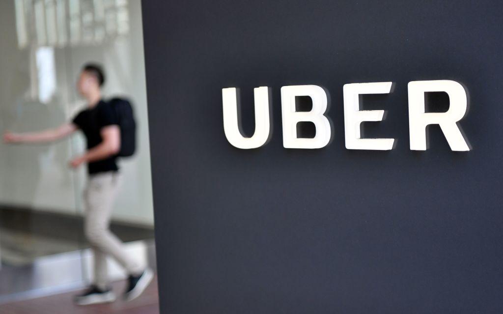 A man walks into the Uber Corporate Headquarters building in San Francisco, Calif., on Feb. 5, 2018. (Josh Edelson/AFP/Getty Images)