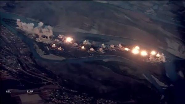 An aerial view showing explosions from an airstrike on the island of Qanus in Iraq, on Sept. 10, 2019. (Operation Inherent Resolve)