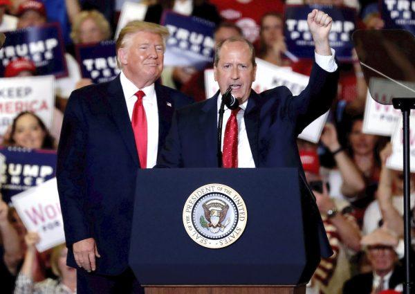 President Donald Trump gives his support to Dan Bishop, a Republican running for the special North Carolina 9th District U.S. Congressional race, as he speaks at a rally in Fayetteville, N.C., on Sept. 9, 2019. (Chris Seward/AP Photo)