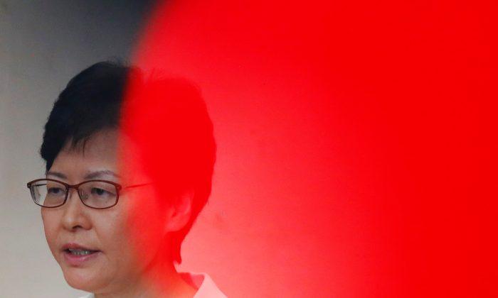 Hong Kong Leader Carrie Lam ‘Has to Serve Two Masters’
