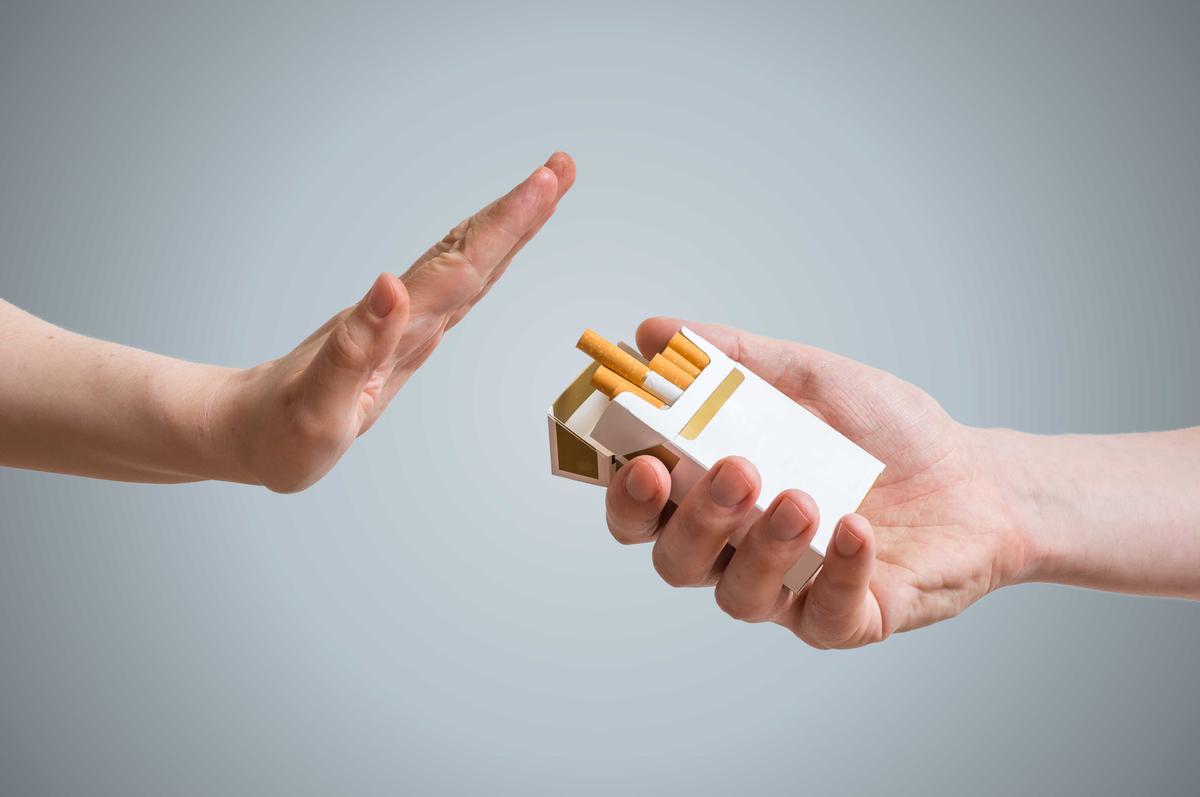 Illustration - Shutterstock | <a href="https://www.shutterstock.com/image-photo/quitting-smoking-concept-hand-refusing-cigarette-466235102?src=-1-35">vchal</a>