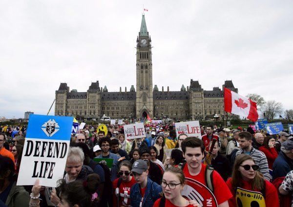 Thousands of pro-life advocates take part in the March for Life on Parliament Hill in Ottawa on May 10, 2018. (THE CANADIAN PRESS/Sean Kilpatrick)