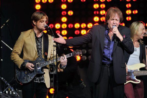 Musicians Desmond Money (L) and Eddie Money perform on stage during the iHeart80s Party 2017 at SAP Center in San Jose, Calif., on Jan. 28, 2017. (Steve Jennings/Getty Images for iHeartMedia)