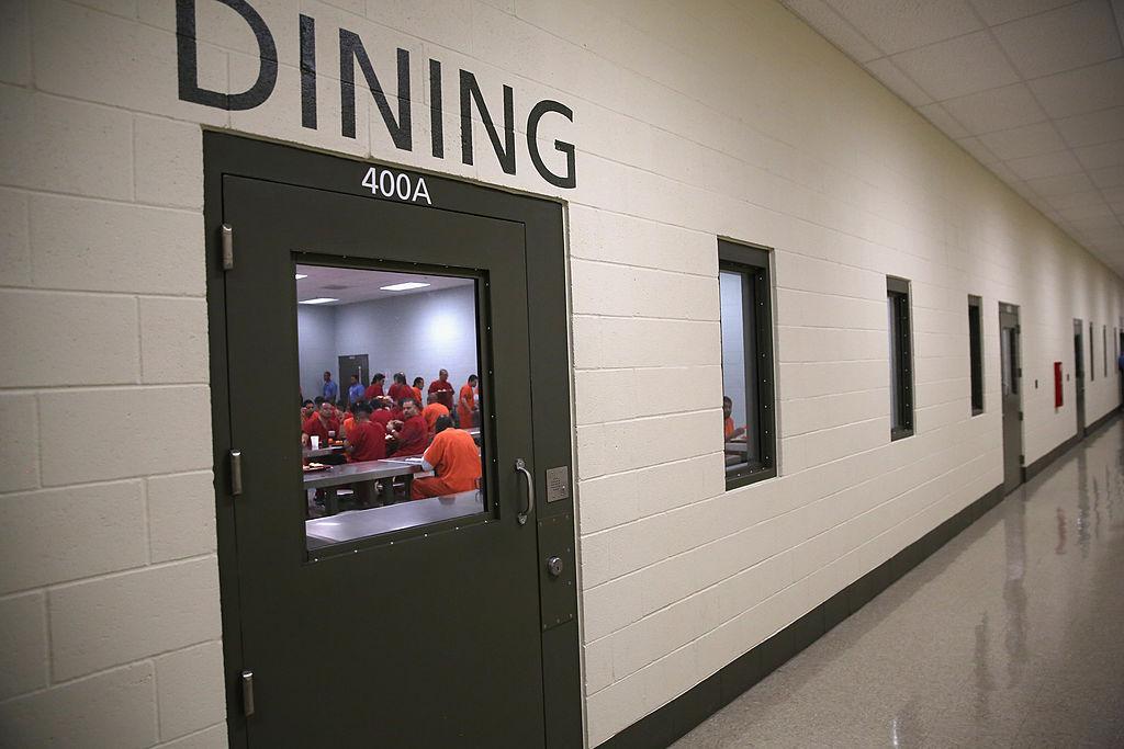 Immigrant detainees eat lunch, at the Adelanto Detention Facility in Adelanto, California on Nov. 15, 2013. (John Moore/Getty Images)