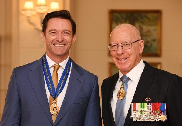 The Governor-General of Australia David Hurley (R) awarding Australian actor Hugh Jackman (L) an Order of Australia at Government House on Sept. 13, 2019, in Melbourne, Australia. (Tracey Nearmy/Getty Images)