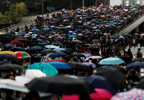 Anti-government protesters march during a demonstration in Hong Kong, on September 15, 2019. (Jorge Silva/Reuters)