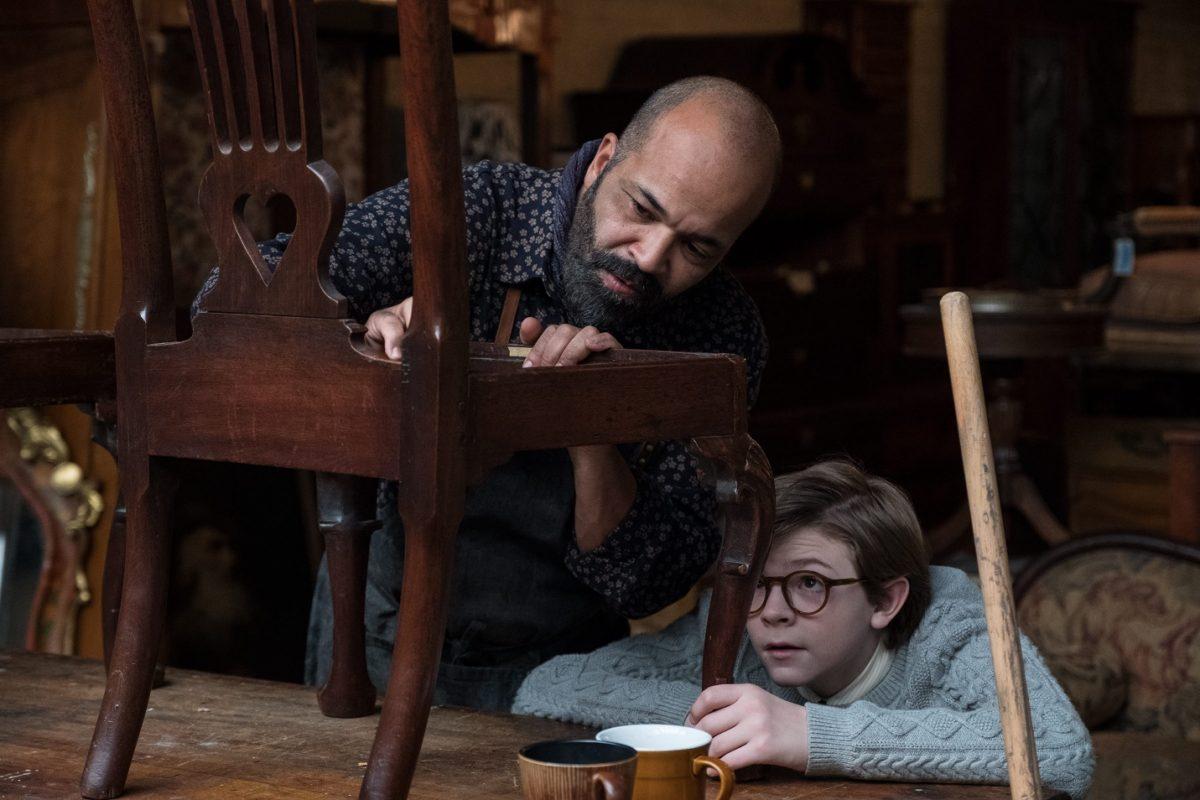 Jeffrey Wright (L) as Hobie and Oakes Fegley as the young Theo Decker, in “The Goldfinch.” (Warner Bros.)