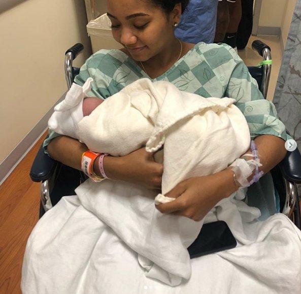 Cleveland Browns defensive end Chris Smith’s girlfriend Petara Cordero holds their newborn daughter Haven Harris Smith. (Courtesy of Chris Smith/Instagram)