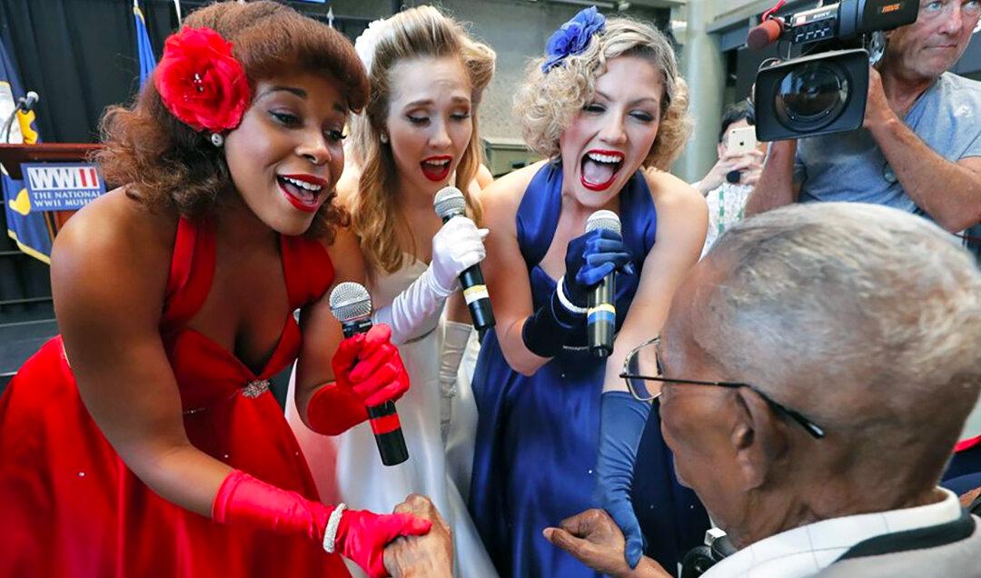 110-Year-Old War Veteran Serenaded and Covered in Kisses