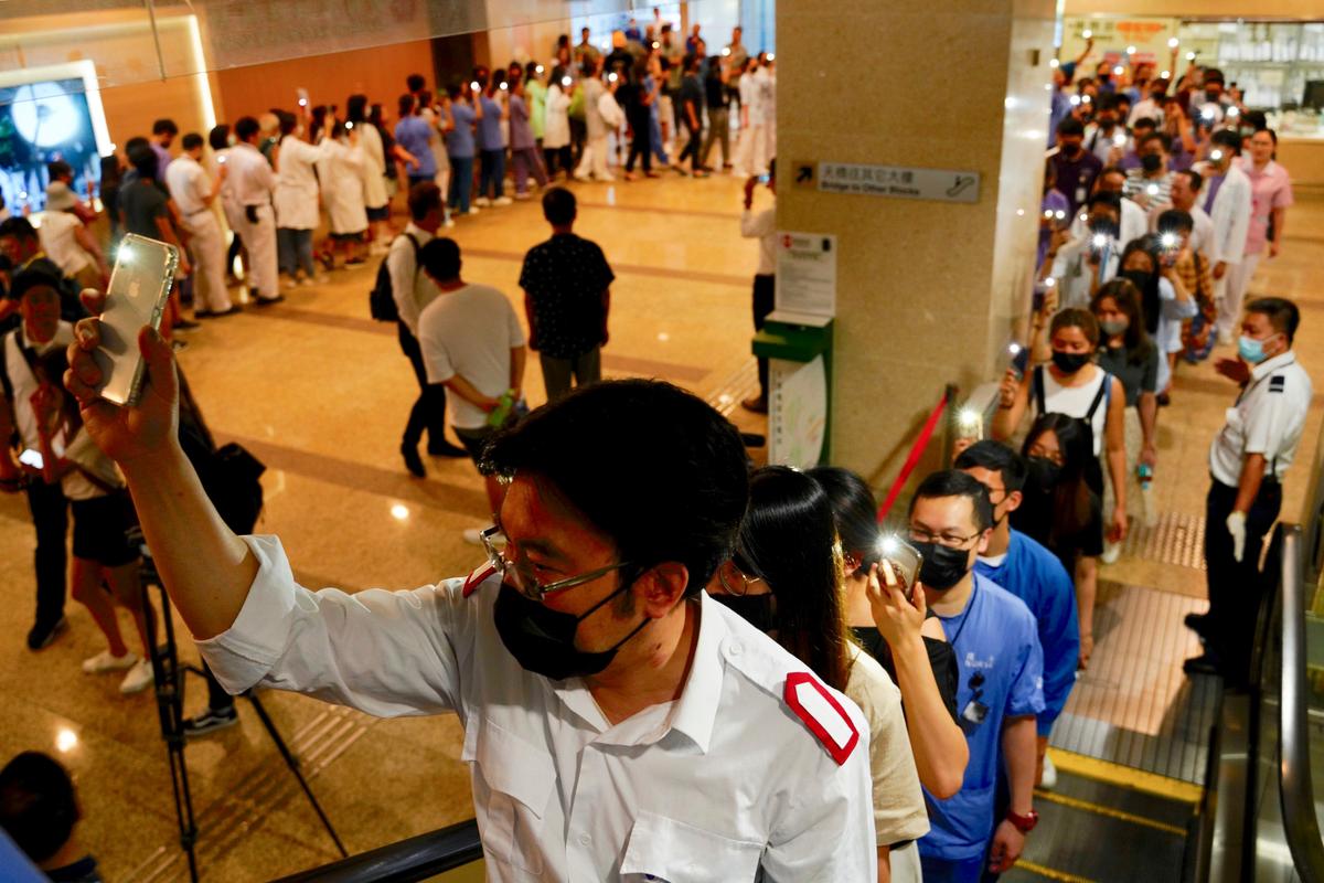 Medical workers protest at the Prince of Wales Hospital in Hong Kong on Sept. 16, 2019. (Vincent Yu/AP)