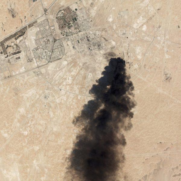 Thick black smoke rising from Saudi Aramco's Abqaiq oil processing facility in Buqyaq, Saudi Arabia, on Sept. 14, 2019. (Satellite image from Planet Labs Inc via AP)