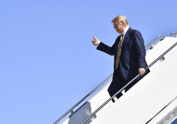 US President Donald Trump waves from Air Force One after landing in Mountain View, Calif., on Sept. 17, 2019. (Nicholas Kamm/AFP/Getty Images)