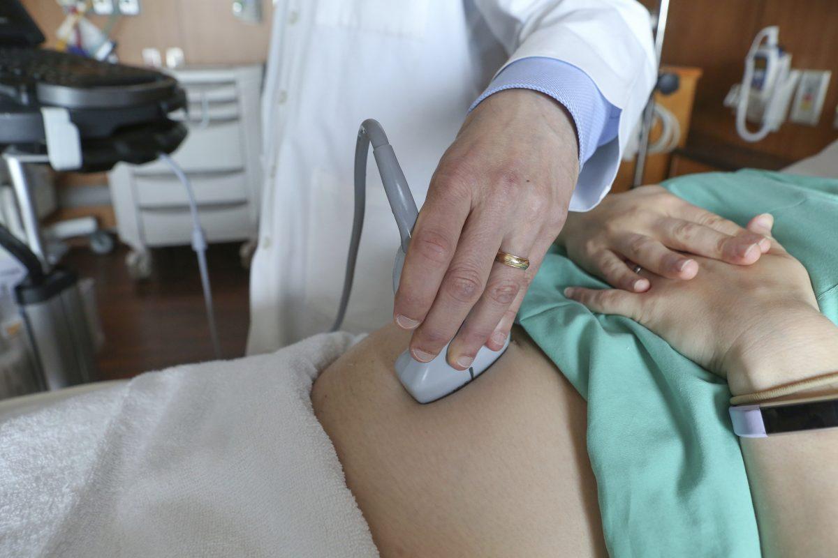 A doctor performs an ultrasound scan on a pregnant woman at a hospital in Chicago. (Teresa Crawford, AP Photo/File)