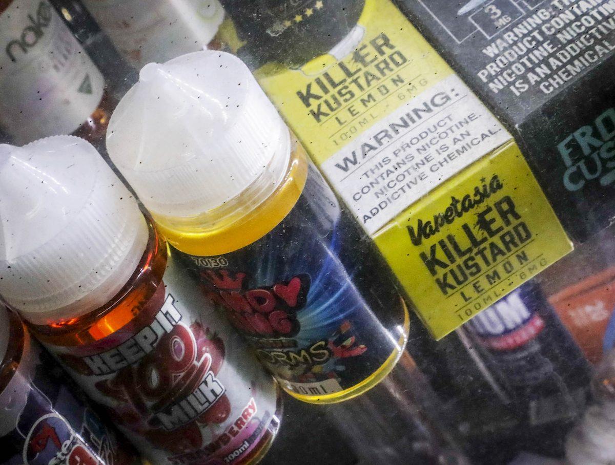 Flavored vaping solutions are shown in a window display on Sept. 16, 2019. (Bebeto Matthews/AP File Photo)