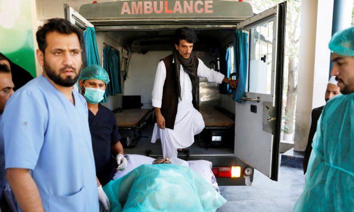 Taliban Attacks Kill 48, Afghan Leader Unhurt as Bomber Targets Rally