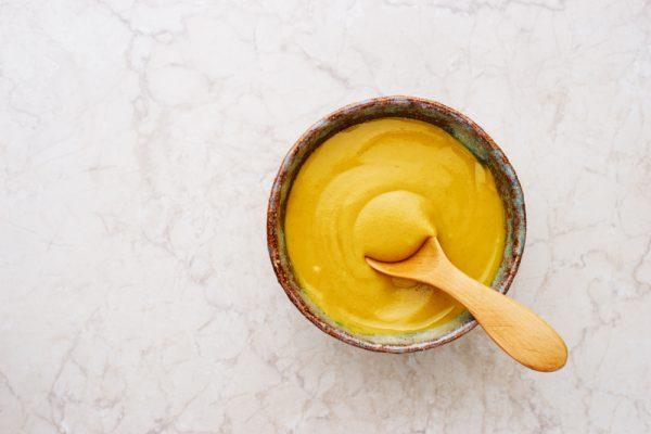 Mustard contains acetic acid, which prompts the body to produce more acetylcholine, the chemical that motor neurons release in order to activate (de-cramp) the muscles. (Shutterstock)