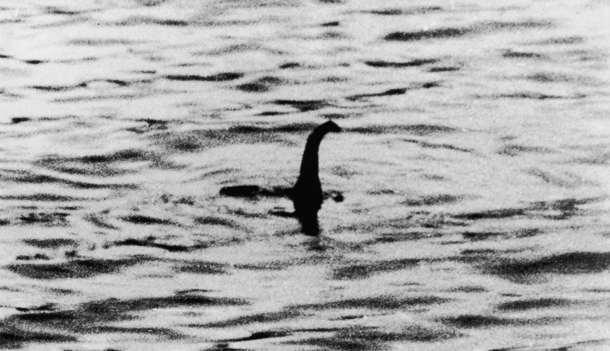 A view of the Loch Ness Monster, near Inverness, Scotland, April 19, 1934. The photograph, one of two pictures known as the 'surgeon's photographs,' was allegedly taken by Colonel Robert Kenneth Wilson, though it was later exposed as a hoax by one of the participants, Chris Spurling, who, on his deathbed, revealed that the pictures were staged by himself, Marmaduke and Ian Wetherell, and Wilson. References to a monster in Loch Ness date back to St. Columba's biography in 565 AD. More than 1,000 people claim to have seen 'Nessie' and the area is, consequently, a popular tourist attraction. (Photo by Keystone/Getty Images)