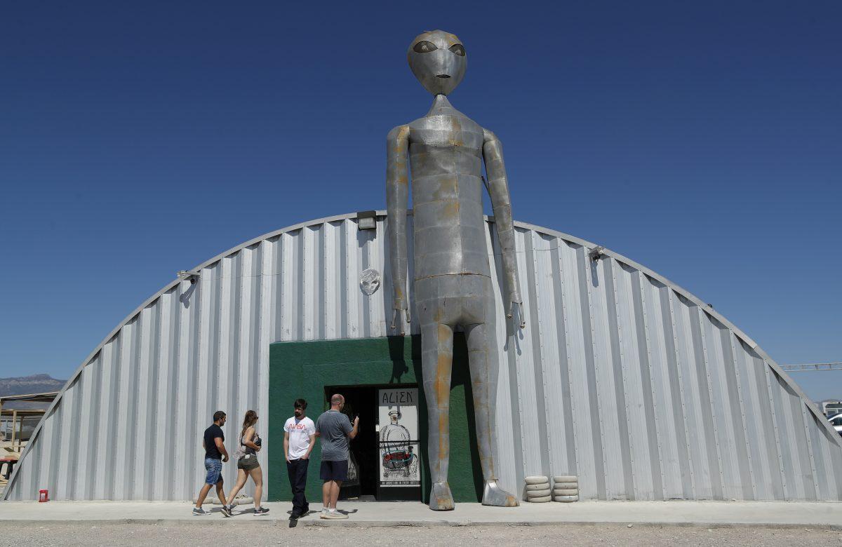 People enter and exit the Alien Research Center in Hiko, Nev., on Sept. 18, 2019. AP Photo/John Locher