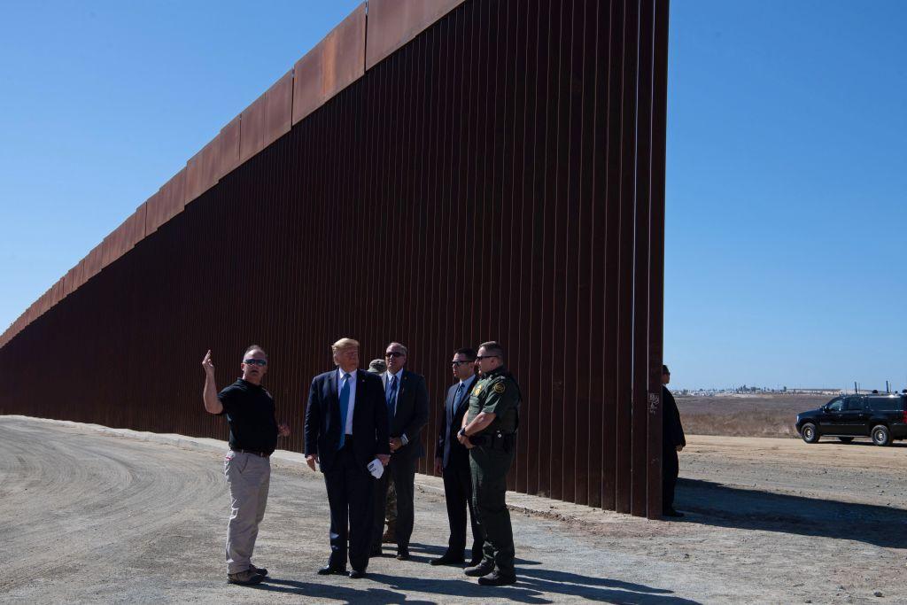 President Donald Trump visits the U.S.–Mexico border fence in Otay Mesa, Calif., on Sept. 18, 2019. (Nicholas Kamm/AFP/Getty Images)