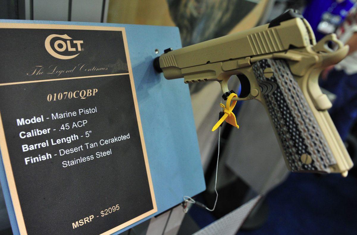 A Colt Close Quarters Combat (CQB) 1911 .45 ACP pistol is displayed during the annual NRA convention in Houston, Texas in 2013. (Karen Bleier/AFP/Getty Images)