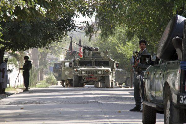 Afghan security forces arrive near the site of a suicide bombing and gun battle as militants attempted to storm a government office, in Jalalabad, the provincial capital of eastern Afghanistan, on Sept. 18, 2019. (AP Photo)