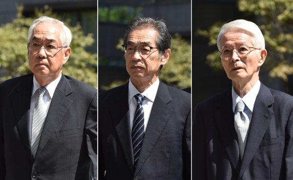 Three former executives from Tokyo Electric Power Company (Tepco), former Chairman Tsunehisa Katsumata (R), former Vice Presidents Ichiro Takekuro (C) and Sakae Muto (L), arriving at the Tokyo District Court, where they were acquitted on Sept. 19, 2019. (Kazuhiro Nogi/AFP/Getty Images)
