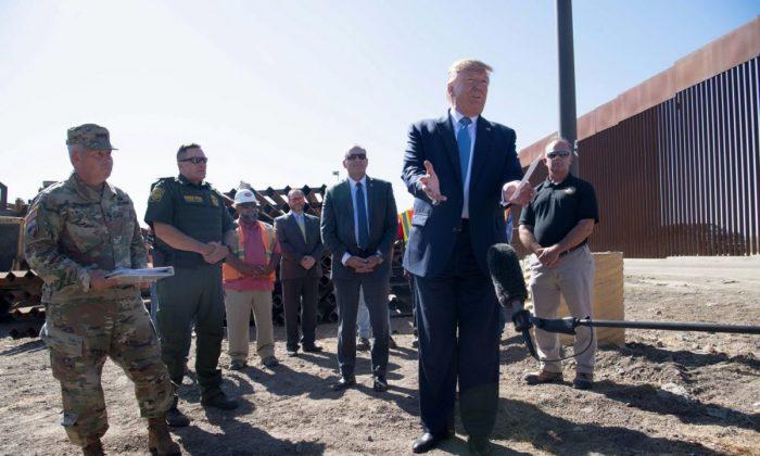 Trump Autographs US–Mexico Border Wall With Sharpie