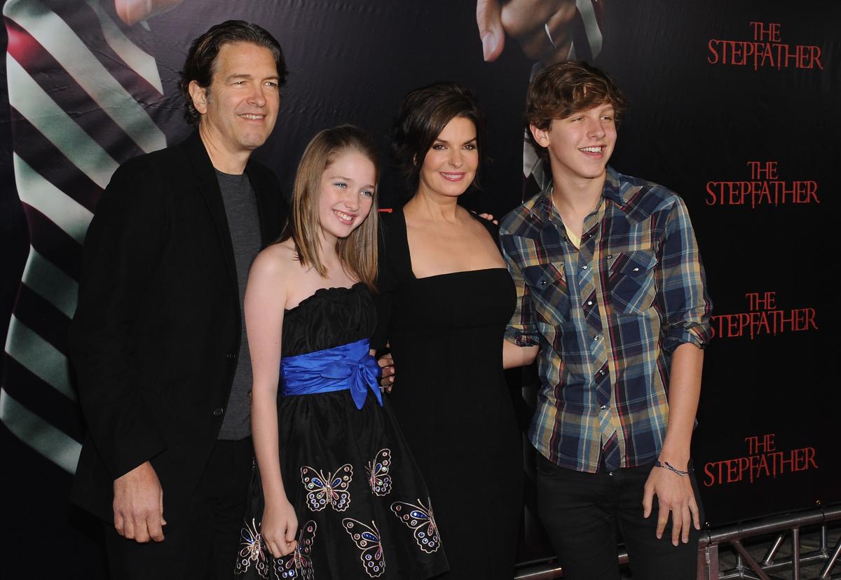 Sela Ward, Howard Sherman, and their children, Anabella and Austin, at the premiere of "The Stepfather" in New York City on Oct. 12, 2009 (©Getty Images | <a href="https://www.gettyimages.com/detail/news-photo/actress-sela-ward-and-guests-attend-the-premiere-of-the-news-photo/91810810">Bryan Bedder</a>)