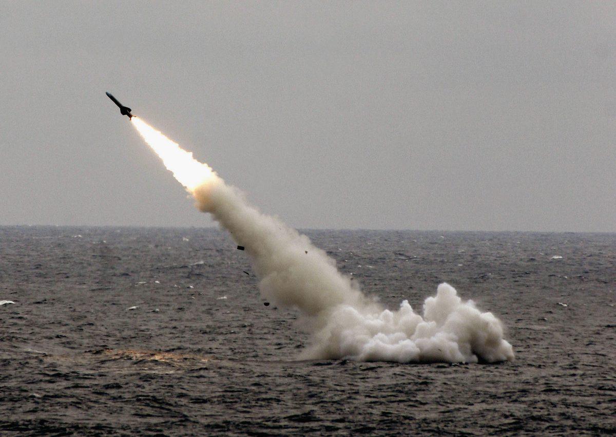 A Chinese submarine launches a missile in an offshore blockade exercise during the third phase of the Sino-Russian "Peace Mission 2005" joint military exercise near China's Shandong Peninsula, on Aug. 23, 2005. (China Photos/Getty Images)