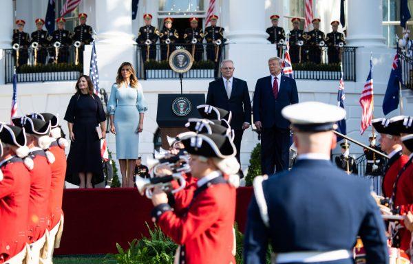 U.S. President Donald Trump and First Lady Melania Trump stand at attention with Australian Prime Minister Scott Morrison (2R) and his wife Jenny Morrison (L) during an Official Visit by the Australian PM at the White House in Washington, DC on Sept. 20, 2019. (Photo by SAUL LOEB/AFP/Getty Images)