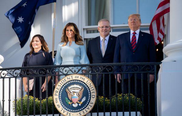 President Donald Trump, First Lady Melania Trump (2L), Australian Prime Minister Scott Morrison (2R) and his wife, Jennifer Morrison (L) look on from a balcony of the White House during an arrival ceremony for an Official Visit on the South Lawn of the White House on Sept. 20, 2019. (Saul Loeb/AFP/Getty Images)