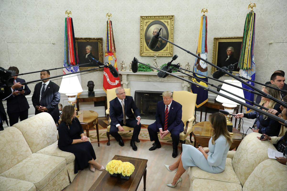 U.S. President Donald Trump and first lady Melania Trump meet with Australia’s Prime Minister Scott Morrison and his wife Jenny Morrison in the Oval Office of the White House in Washington, U.S., September 20, 2019. REUTERS/Jonathan Ernst