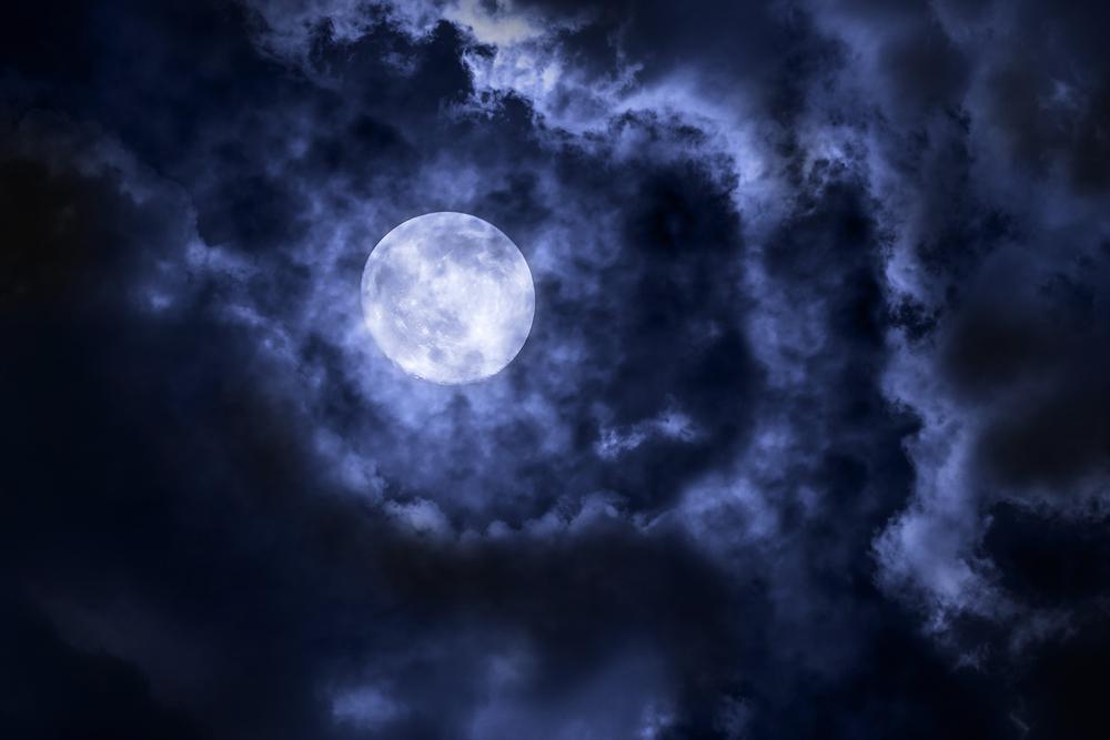Illustration - Shutterstock | <a href="https://www.shutterstock.com/image-photo/full-moon-cloud-night-364614383?src=MChJMLiwN4UCwC0ThhKNjA-1-48">NAAN</a>