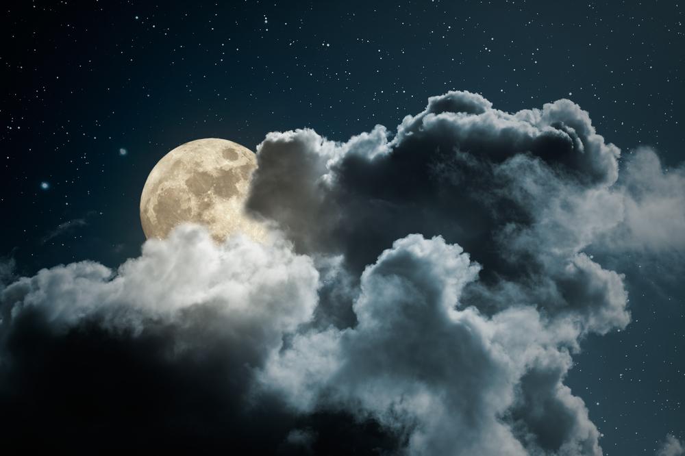 Illustration - Shutterstock | <a href="https://www.shutterstock.com/image-photo/full-moon-behind-clouds-on-starry-185867567?src=wrJx2jUjIMEOY0tn-ukLPw-1-8">Zacarias Pereira da Mata</a>