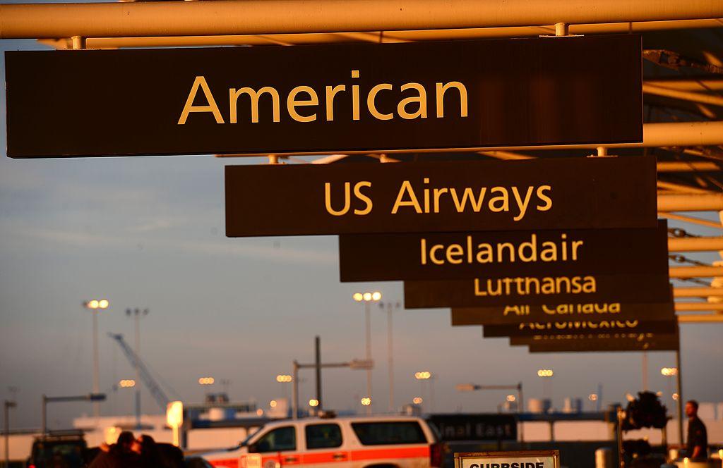 American Airlines sign at Denver International Airport in Denver, on Dec. 9, 2013. (Emmanuel Dunand/AFP/Getty Images)