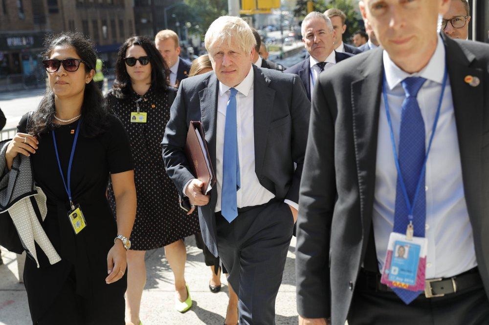 Britain's Prime Minister Boris Johnson walks down the street near United Nations headquarters in New York, on Sept. 23, 2019. (Seth Wenig/AP Photo)