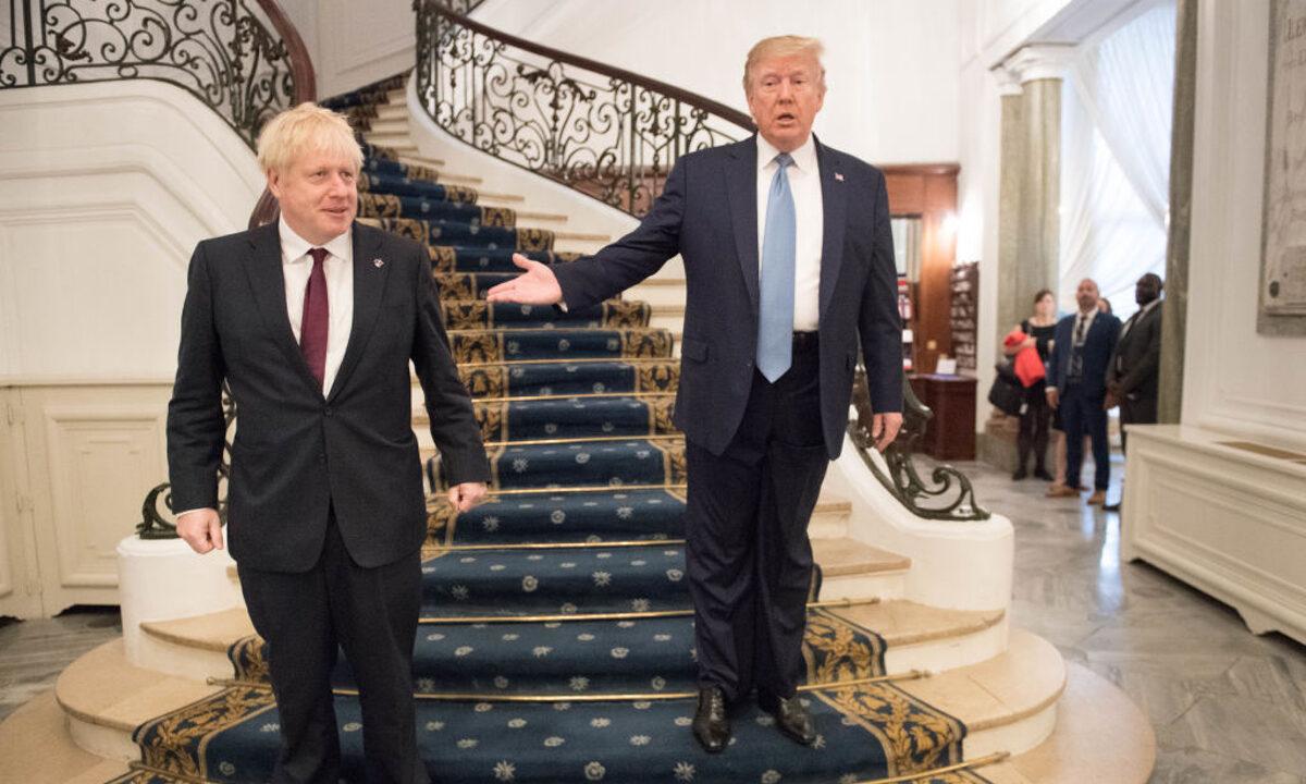 President Donald Trump and Britain's Prime Minister Boris Johnson arrive for a bilateral meeting during the G7 summit in Biarritz, France, on Aug. 25, 2019. (Stefan Rousseau - Pool/Getty Images)
