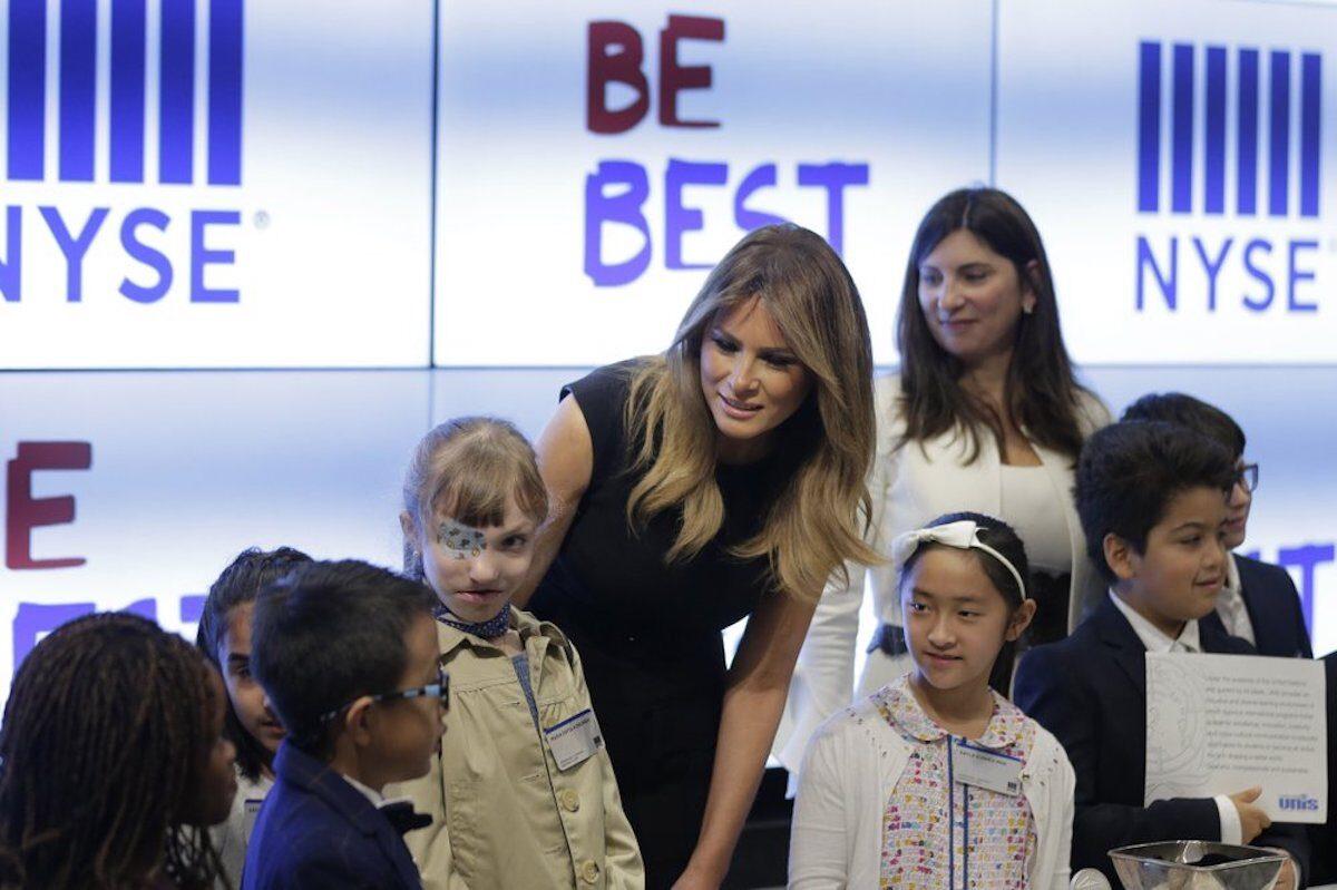 First Lady Melania Trump, center, talks with third and fourth graders from the United Nations International School during a tour of the New York Stock Exchange in New York City, on Sept. 23, 2019. (Seth Wenig/AP Photo)