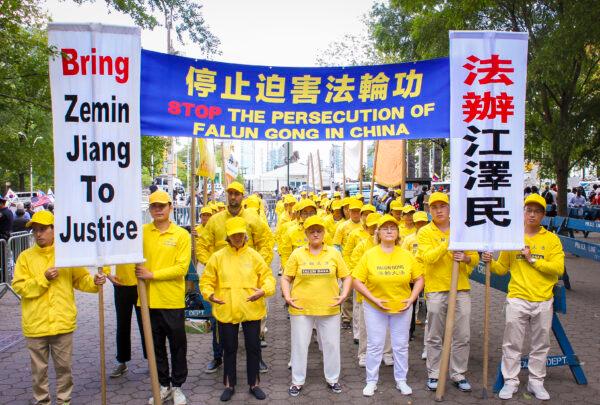 Falun Gong practitioners protest the persecution inside China at United Nations Plaza on Sept. 24, 2019. (Eva Fu/The Epoch Times)