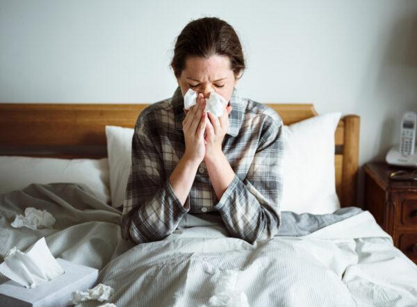 A woman suffering from flu. (Shutterstock)