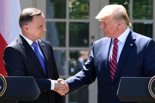 President Trump and Polish President Andrzej Duda shake hands after holding a joint press conference in the Rose Garden of the White House in Washington on June 12, 2019. (Saul Loeb/AFP/Getty Images)