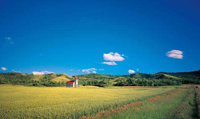 Rich rolling farmland covers the province's southern plains and rivers, lakes, and forests in the north. (Tourism Saskatchewan)