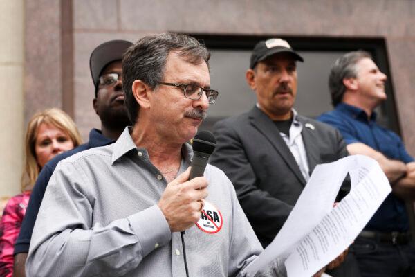 Brad Botwin, director of Help Save Maryland, speaks at a rally against sanctuary policies that shield illegal aliens from federal authorities, in Montgomery County, Md., on Sept. 13, 2019. (Charlotte Cuthbertson/The Epoch Times)
