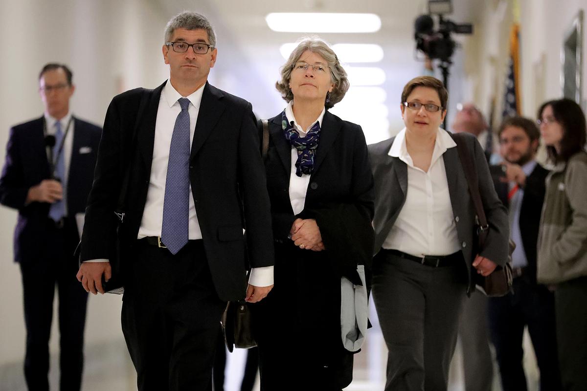 Fusion GPS contractor Nellie Ohr (C) arrives for a closed-door interview with investigators from the House Judiciary and Oversight committees in the Rayburn House Office Building on Capitol Hill in Washington, DC, on Oct 19, 2018. (Chip Somodevilla/Getty Images)