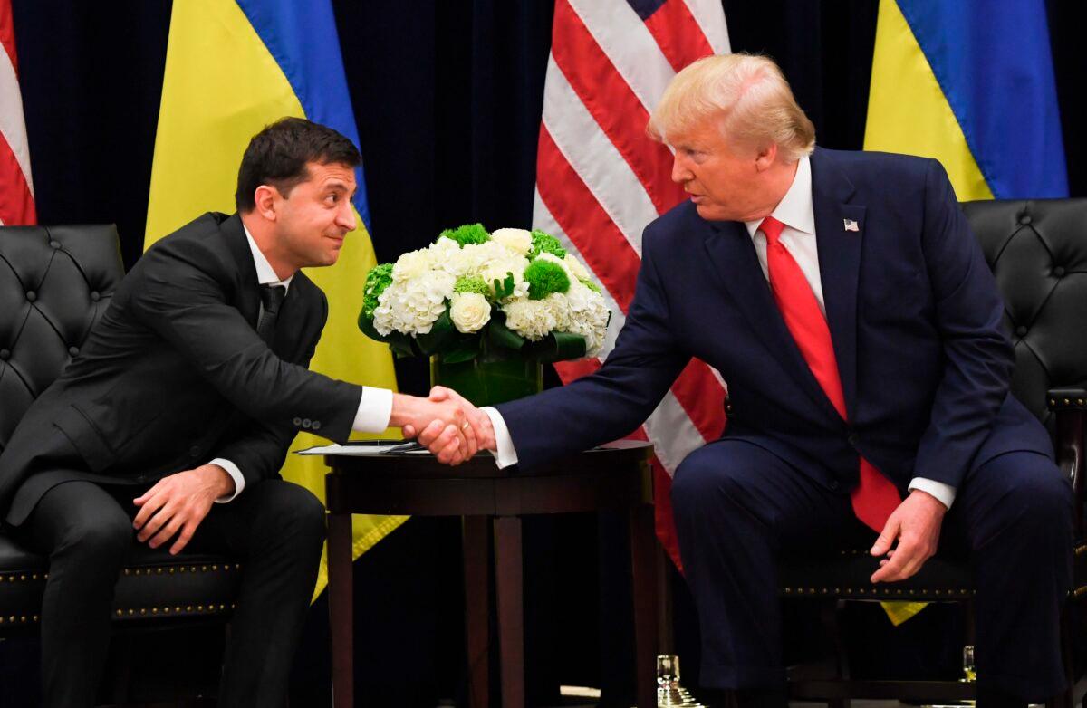 President Donald Trump and Ukrainian President Volodymyr Zelensky shake hands on the sidelines of the United Nations General Assembly in New York on Sept. 25, 2019. (Saul Loeb/AFP/Getty Images)