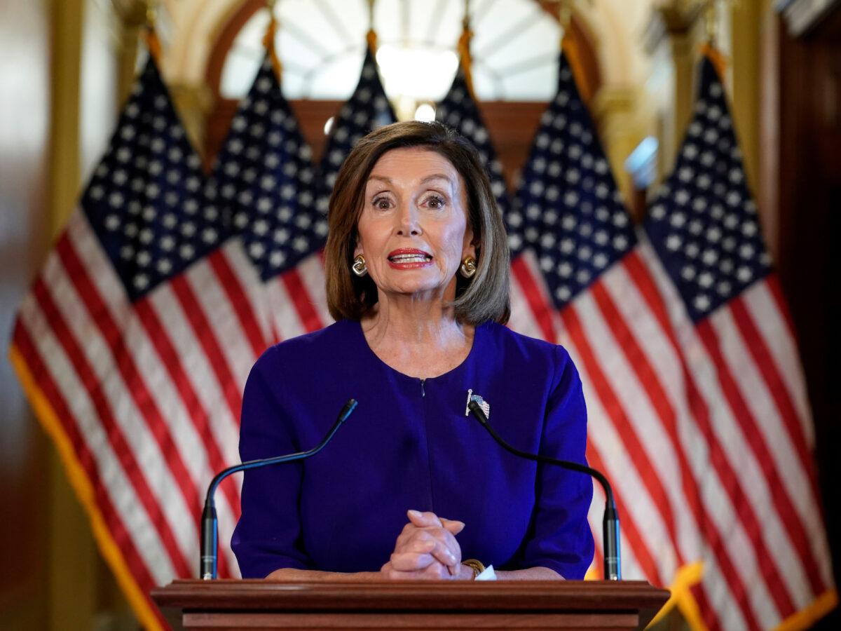 House Speaker Nancy Pelosi (D-Calif.) announces the House of Representatives will launch a formal inquiry to investigate whether to impeach President Donald Trump following a closed House Democratic caucus meeting at the U.S. Capitol in Washington on Sept. 24, 2019. (Kevin Lamarque/Reuters)