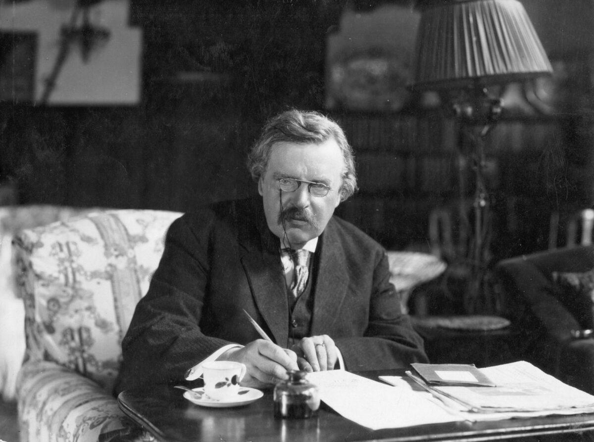 G.K. Chesterton at work. Crisis Magazine. (Public Domain)